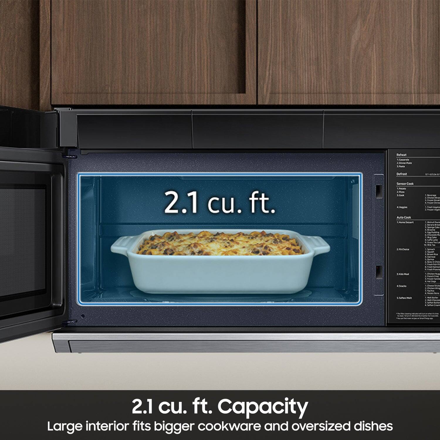 Reheat  
1. Casserole  
LAND  
Defrost  
2.1 cu. ft.  
Sensor Cook UMAI  
2. Km 5.0ml Kingies Auto-Cook  
how That  
2,00  
la  
168  
4.5ndo  
MW  
2.1 CU. ft. Capacity  
Large interior fits bigger cookware and oversized dishes