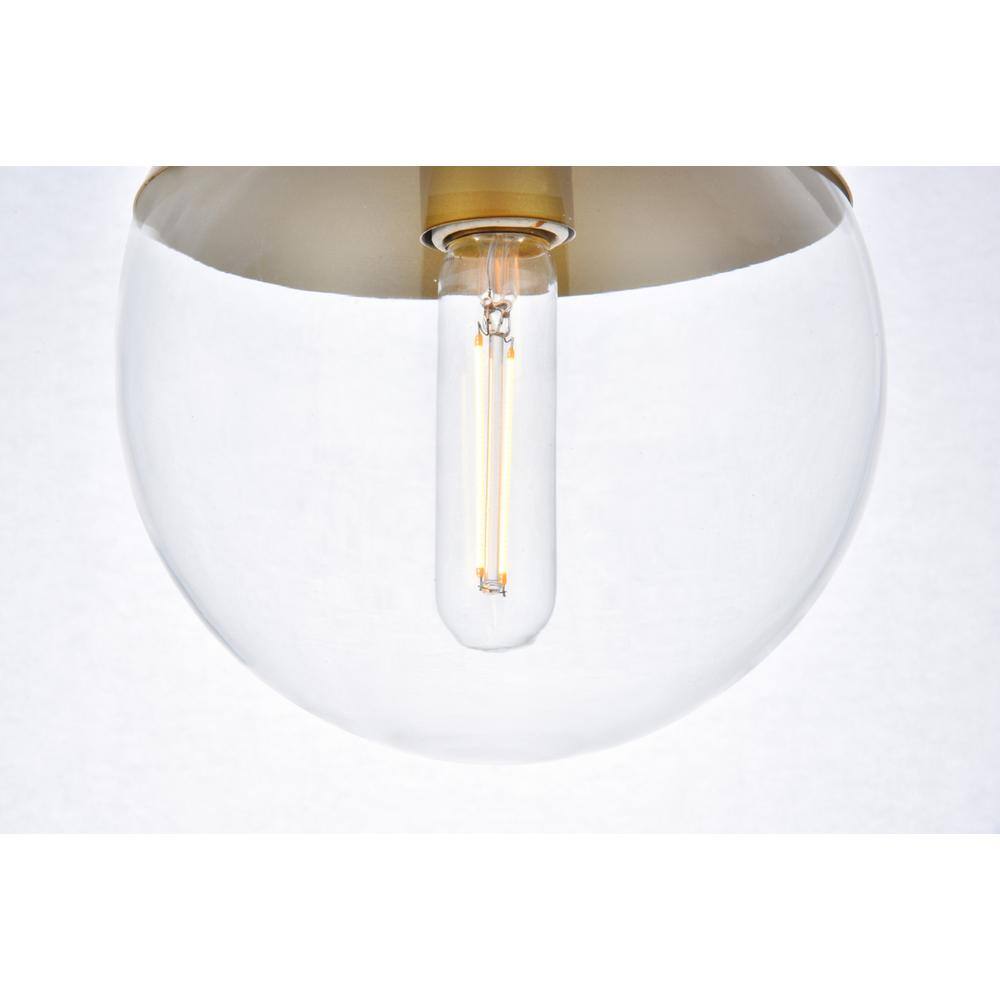 Left. Living District - Eclipse 1 Light Brass Pendant With Clear Glass - Brass And Clear.