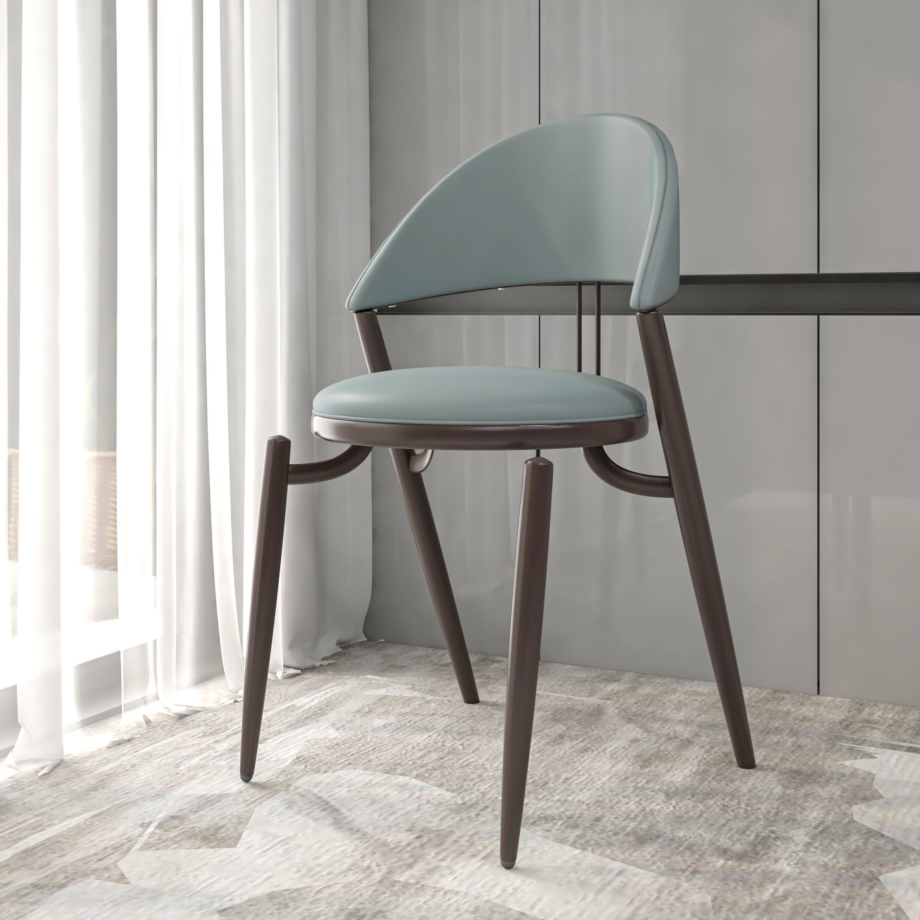Angle. LeisureMod - Venice 4-PCS Contemporary Leather Dining Chair with Sturdy Iron Legs - Light Grey.