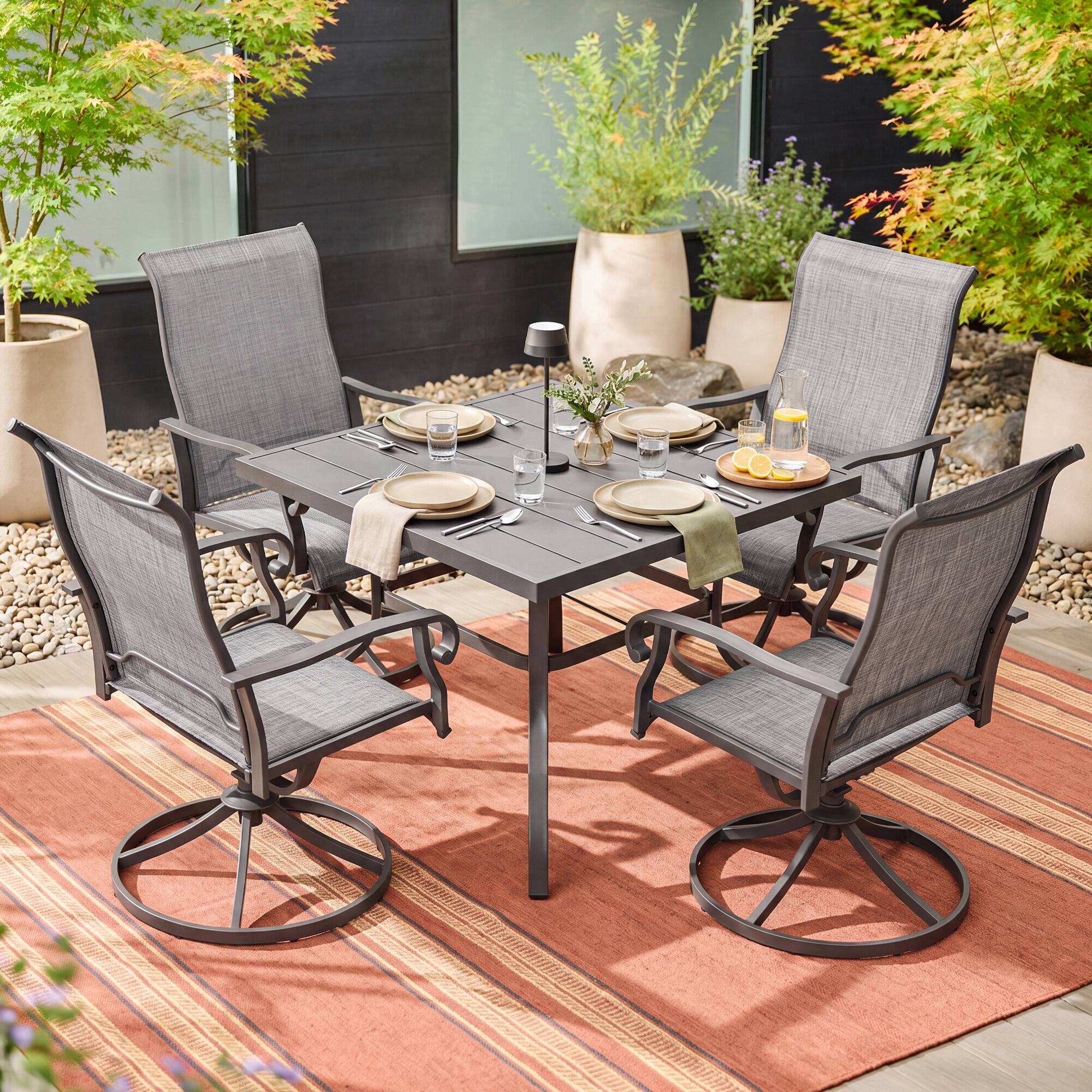 Angle. Nuu Garden - 5-Piece Outdoor Dining Set with Umbrella Hole, Textilene Swivel Chairs - Gray.