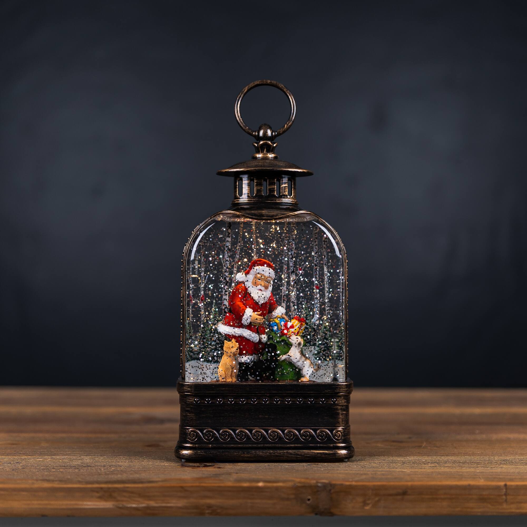 Angle. BreeBe - LED Snow Globe Lantern with Santa and Dog 11.25"H - Bronze.