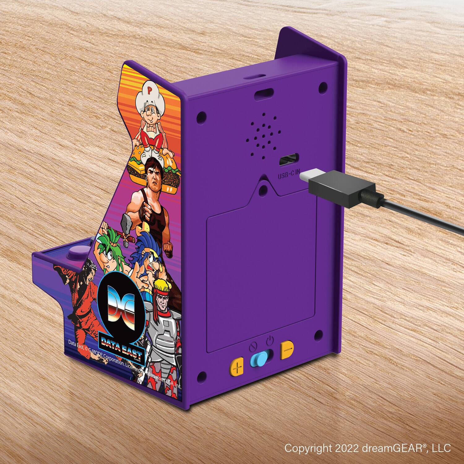 Sure, here is the corrected and grouped text from the image:

---

**Front Side:**

- **Data East**
- **DATA EAST**
- **Data East® - gaming corporation, Limited**
- **Copyright 2022 dreamGEAR®, LLC**

**Back Side:**

- **USB-C IN**
- **P USB-C IN**
- **DATA EAST**
- **Copyright 2022 dreamGEAR®, LLC**

---

This text is grouped based on its location on the device.