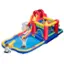 The image shows a group of children playing on a large inflatable playground, which includes a slide and a castle. There are at least four children visible in the scene, with one child sitting on the slide, another standing nearby, and two more children playing in the background. The playground appears to be a fun and engaging place for the children to enjoy themselves.