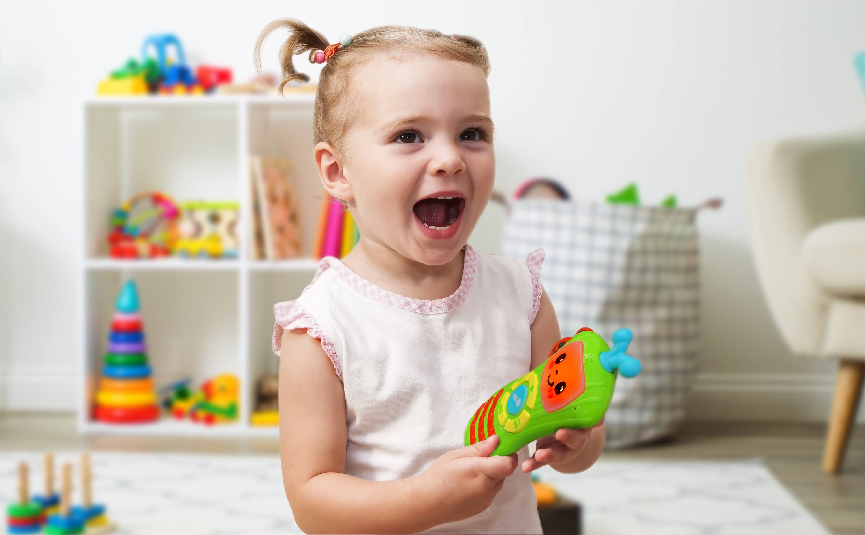 Back. eKids - eKids Cocomelon Toy Remote Control with Built-in Music.