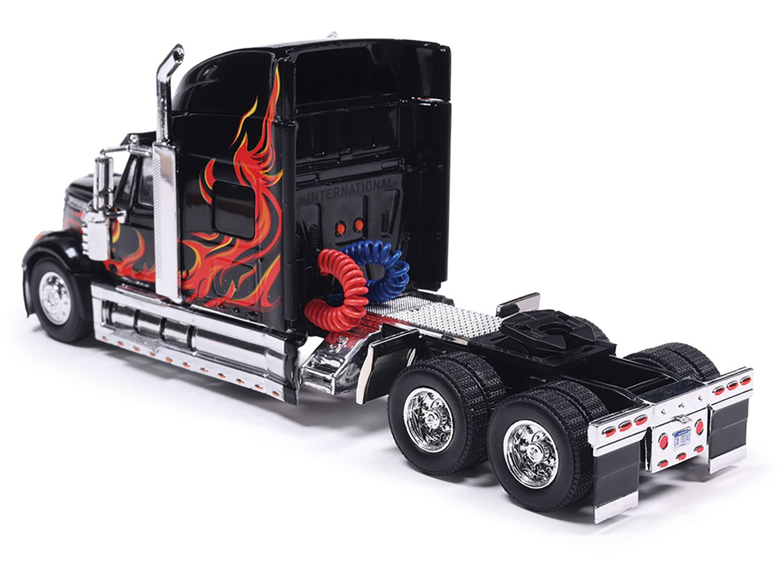 Left. IXO - 2010 International Lonestar Truck Tractor Black with Flame Graphics 1/64 Diecast Model by IXO Models - Black.