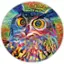 The text on the image reads "Chine en fabrication Chine/ Made in 2022. Toys a TGG Dawn Hudson. Shutterstock." This text suggests that the image was created in China and is a product of 2022. The image features a colorful owl with yellow eyes, which might be a toy or part of a Shutterstock collection.