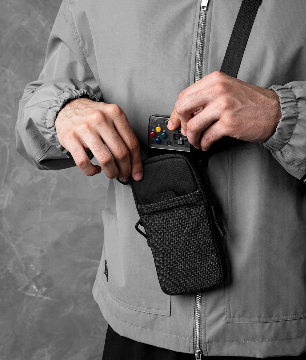 Left. ALPAKA - Modular Shoulder Pocket Slim Phone Sling Bag, Crossbody Pouch with Card Sleeve, Belt/Bag Attachment - Black Ultradyne 100D.