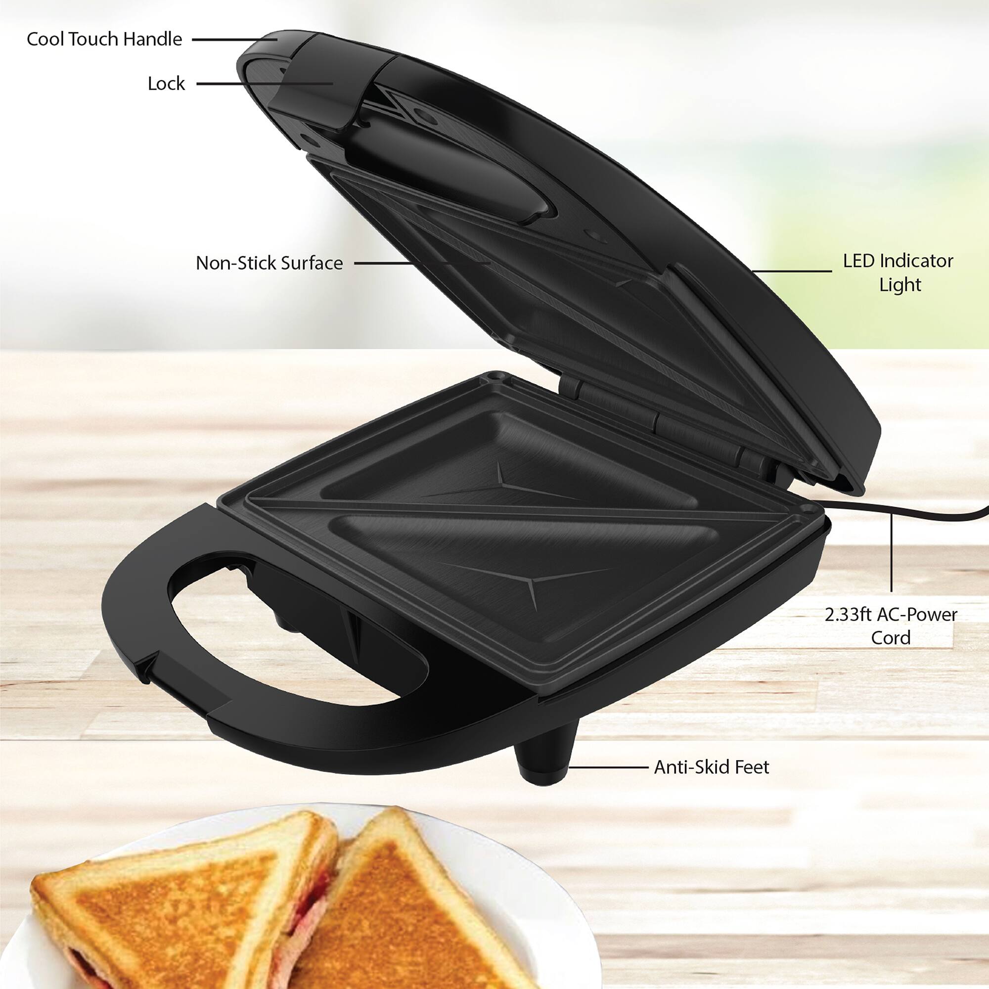 Cool Touch Handle  
Lock  
Non-Stick Surface  
LED Indicator Light  
2.33ft AC-Power Cord  
Anti-Skid Feet