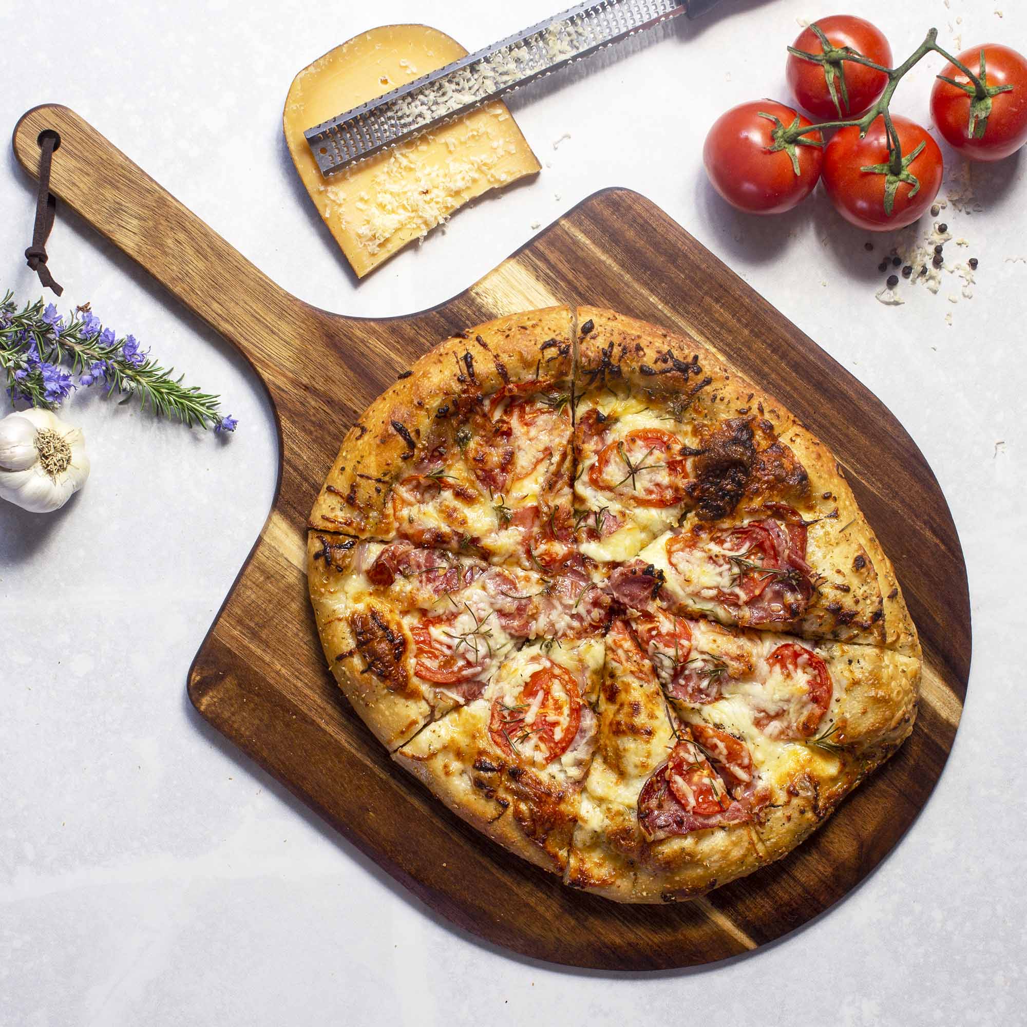 Angle. Rock & Branch - Acacia Wood Pizza Peel, 23-1/4" x 13-3/4".