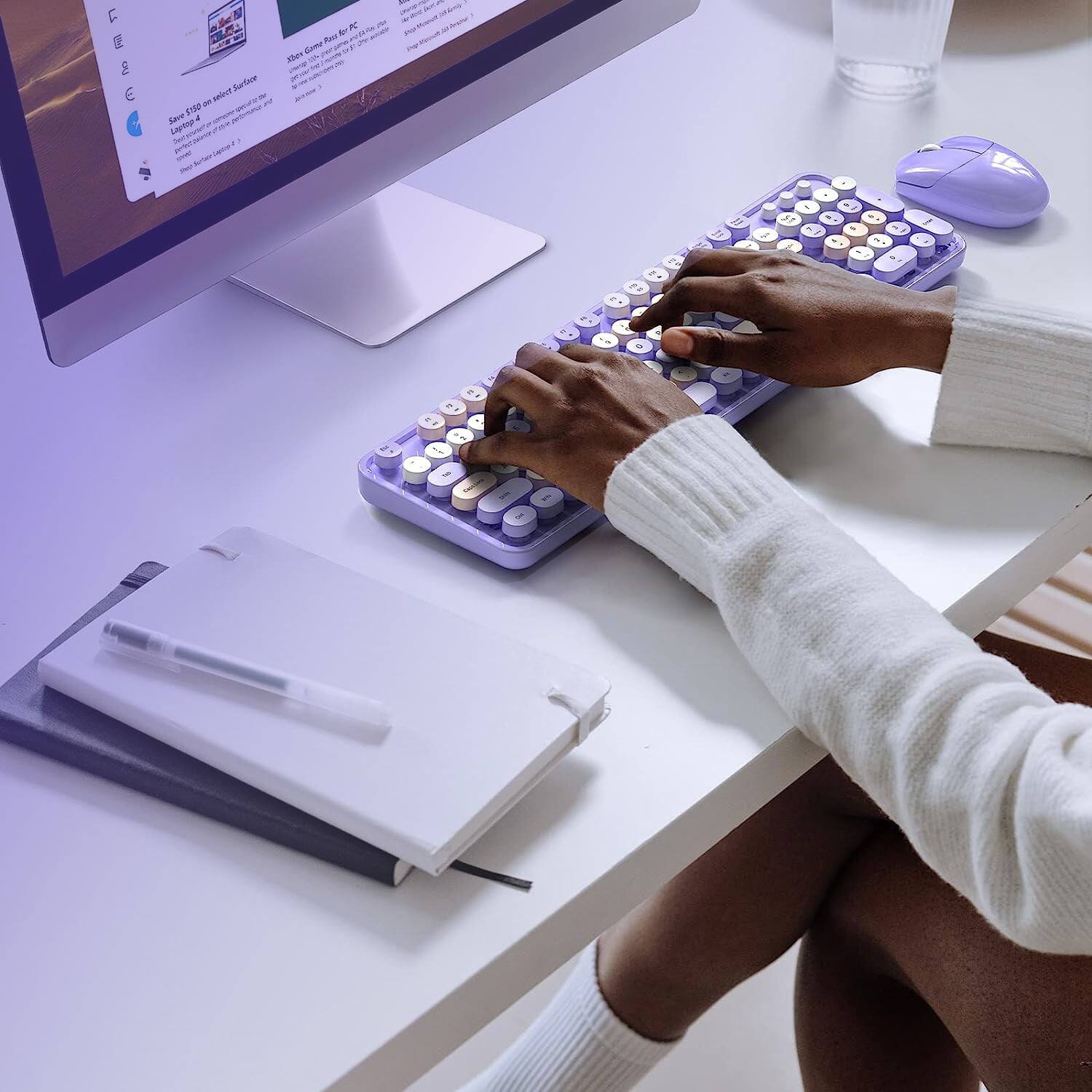 The text in the image reads:

"Save $150 on select Surface devices
Laptop, Studio G, or Pro 9
Add a Microsoft 365 subscription for $10/mo. for 12 mo. and get a free Surface Pen

Make Game Pass to PC
Get access to over 100 games on your PC for $10/mo. or $80/yr. Try it free for 1 mo.