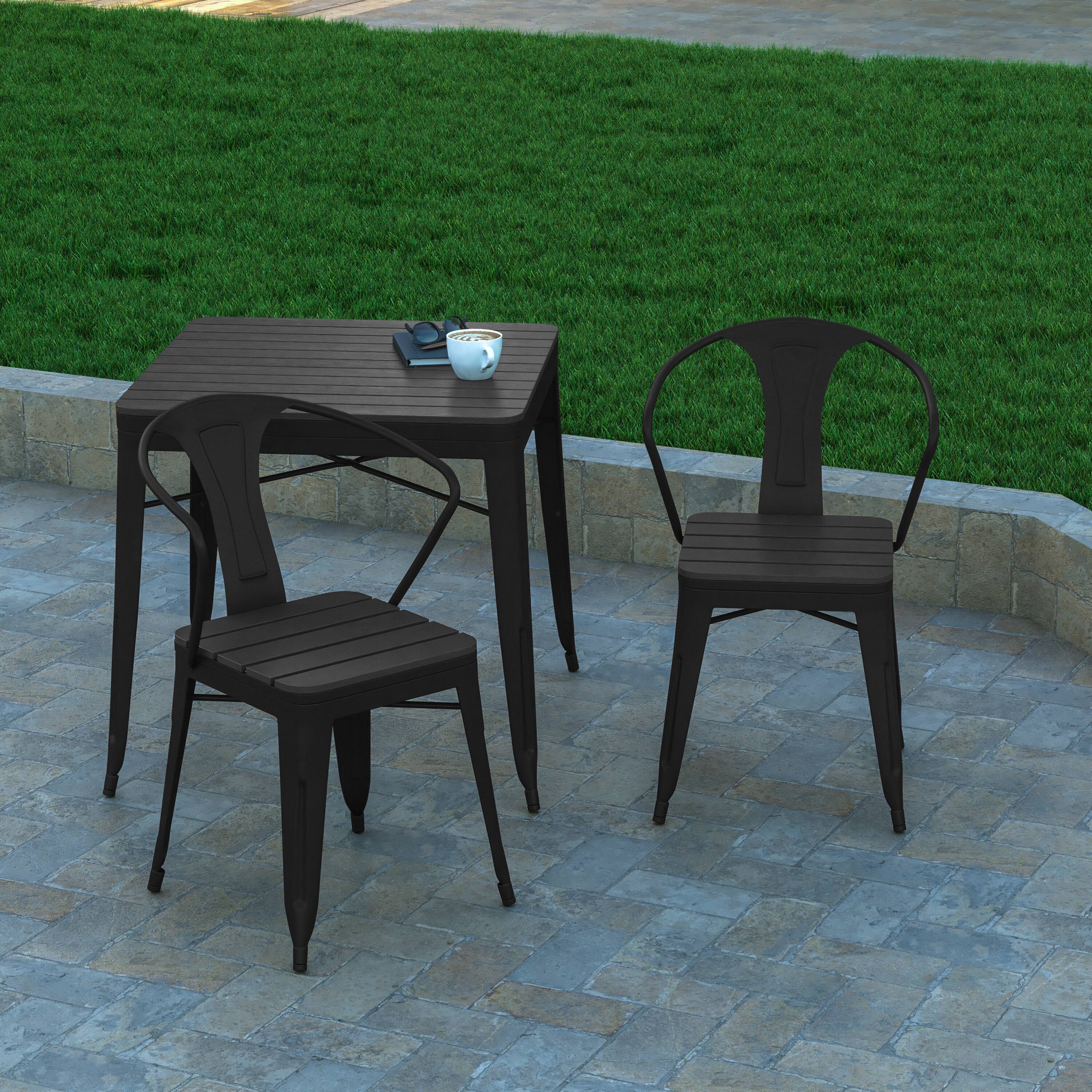 Alt View 4. Emma + Oliver - All-Weather Metal Stack Chair with Arms and Polyresin Seat and Back - Black.