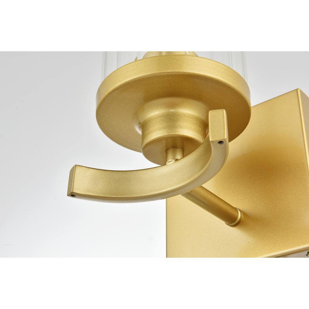 Angle. Living District - Saanvi 1 light Brass and Clear Bath Sconce - Brass And Clear.