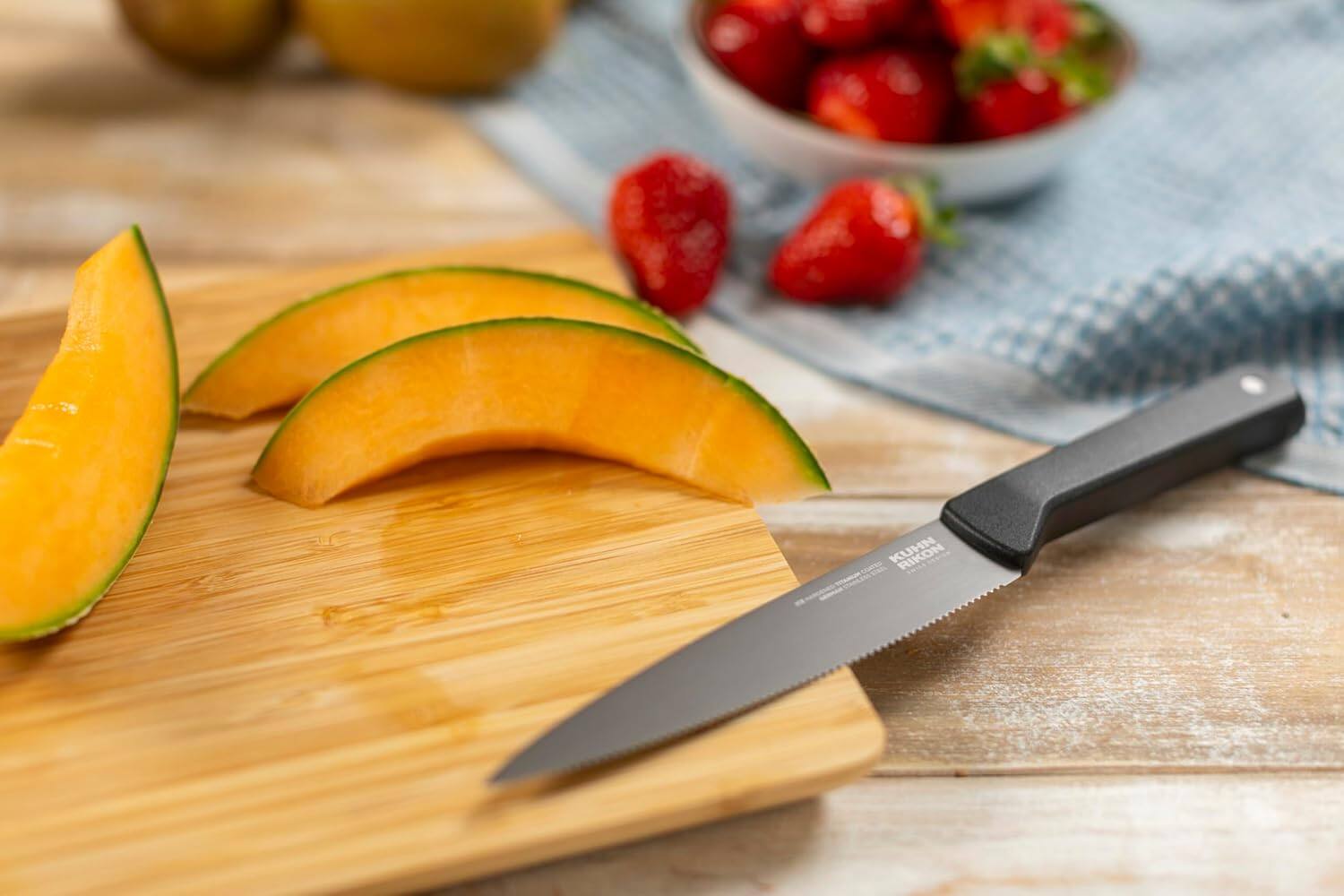 Alt View 1. Kuhn Rikon - ICED Serrated Utility Knife 5.12-Inch, Ice Hardened German Stainless Blade - Black.