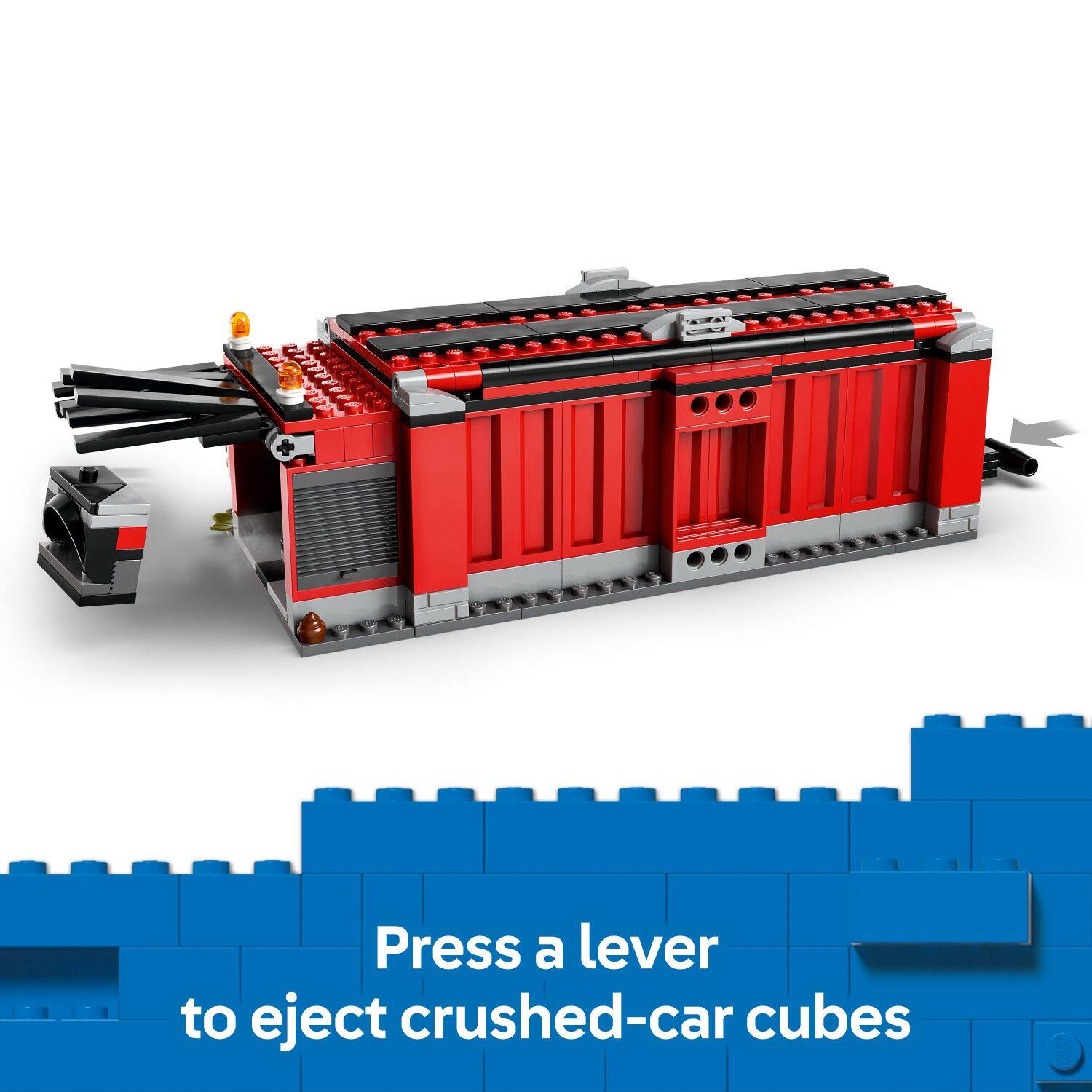 Press a lever to eject crushed-car cubes.