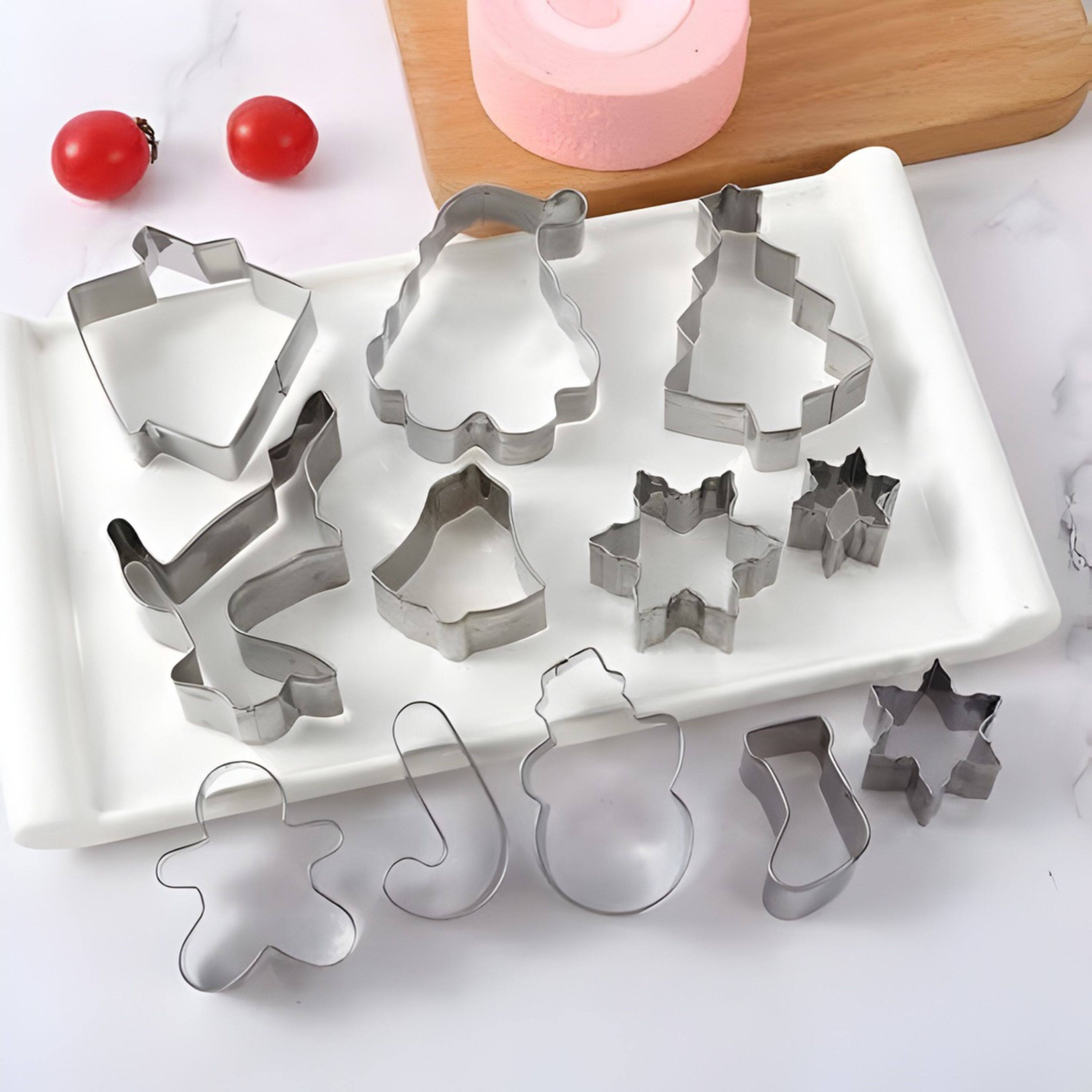 Left. Kitcheniva - Christmas Cookie Cutter Variety Pack - Christmas Tree, Santa, Gingerbread Man, Snowman, Reindeer.