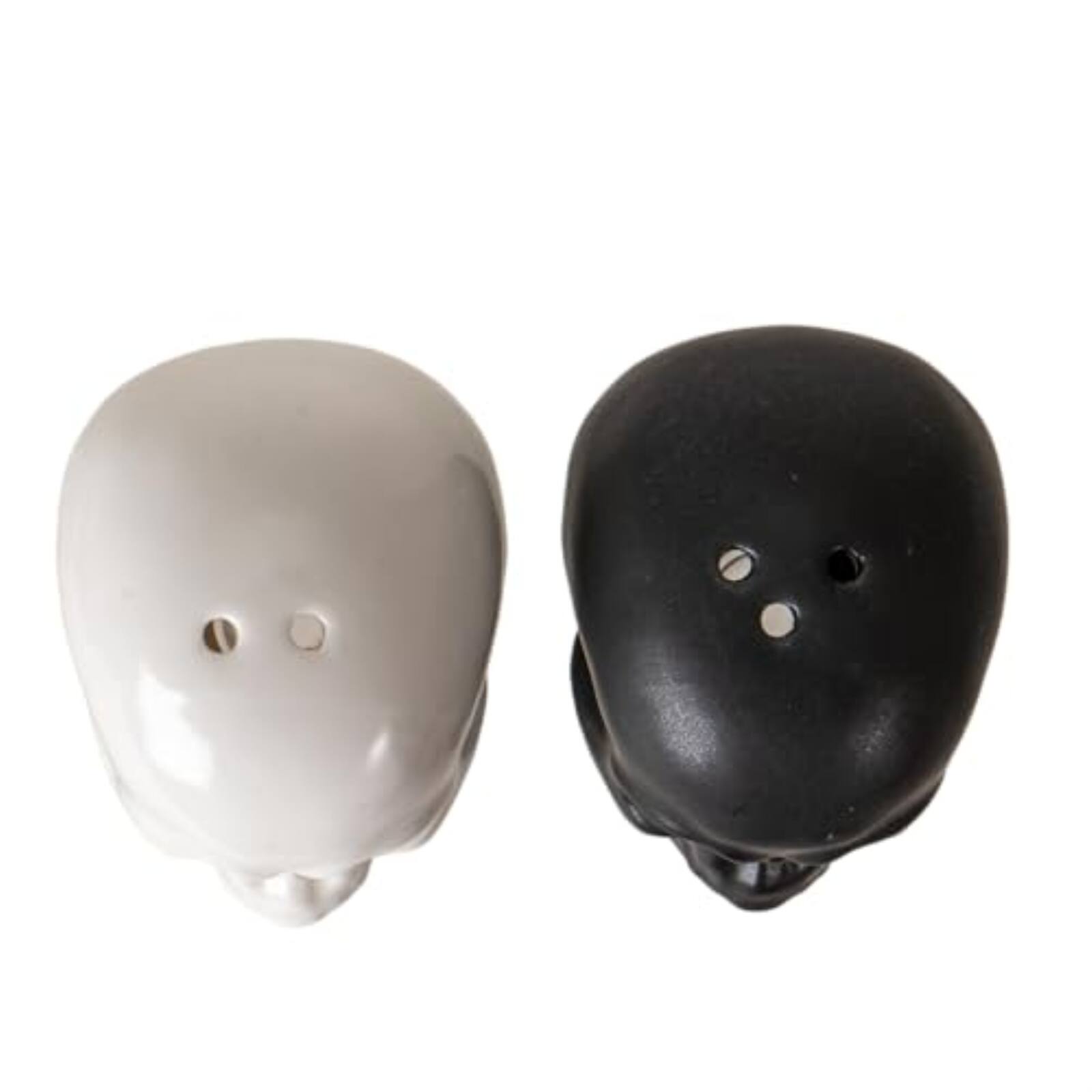 Left. Pacific Trading - Black and White Skulls Ceramic Salt And Pepper Shaker Set - Multicolor.