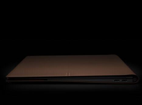 Closed HP laptop with leather cover. Windows 10. Intel Core i7 8th Gen.