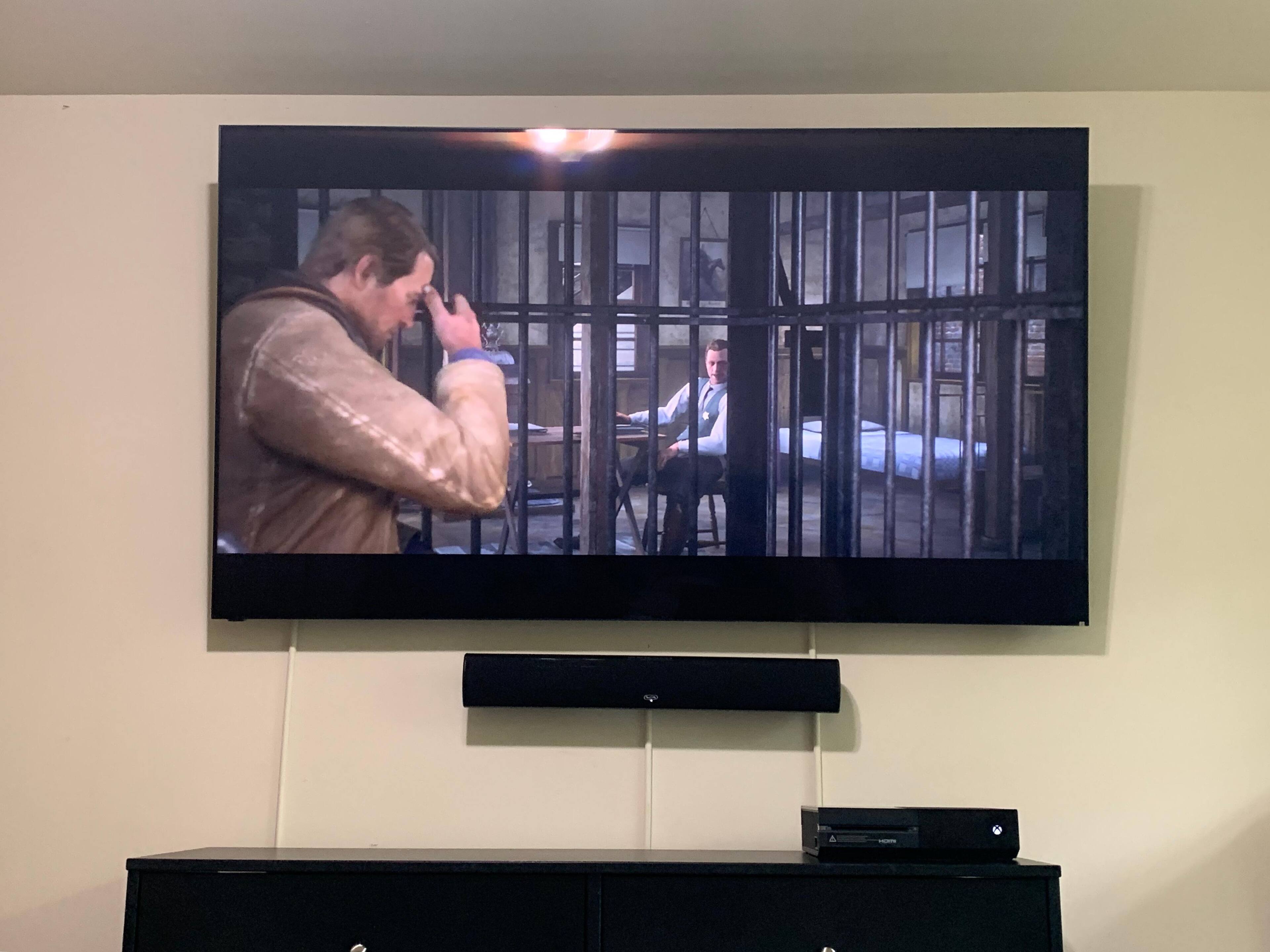 Display on Wall with Red Dead Redemption 2 Gameplay, click to load a larger version