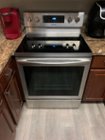 Samsung 5.8 cu. ft. Freestanding Electric Convection Range with Air Fry,  Fingerprint Resistant Stainless Steel NE59T7511SS/AA - Best Buy