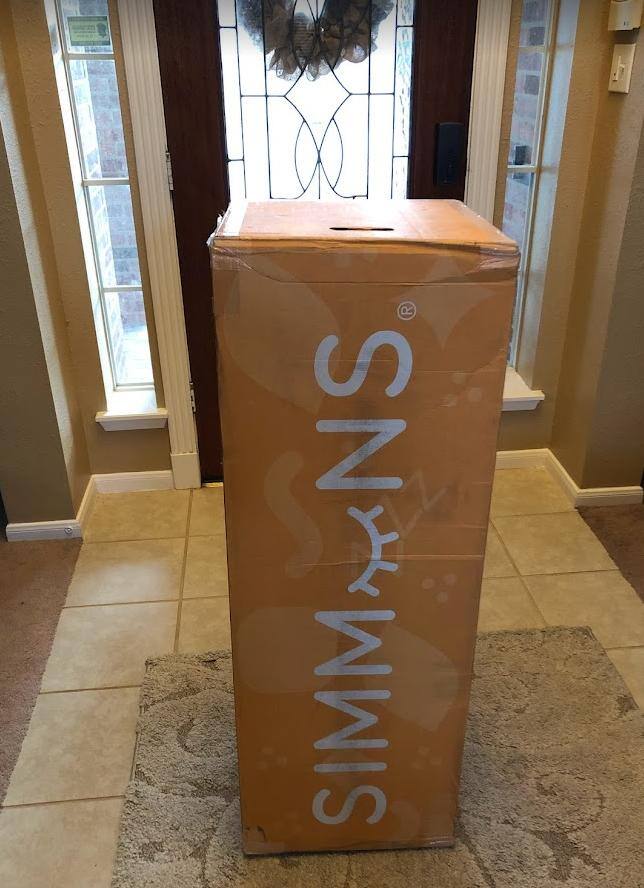 Box made it with no issues - still heavy, but handles made it easier to handle than a regular mattress., click to load a larger version