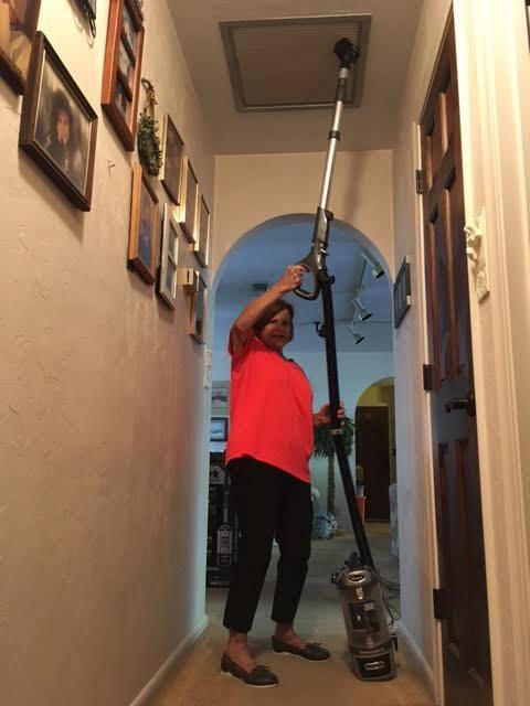 NO ladders or step stools neded to clean ceiling grilles. Shark has great rreach from floor., click to load a larger version