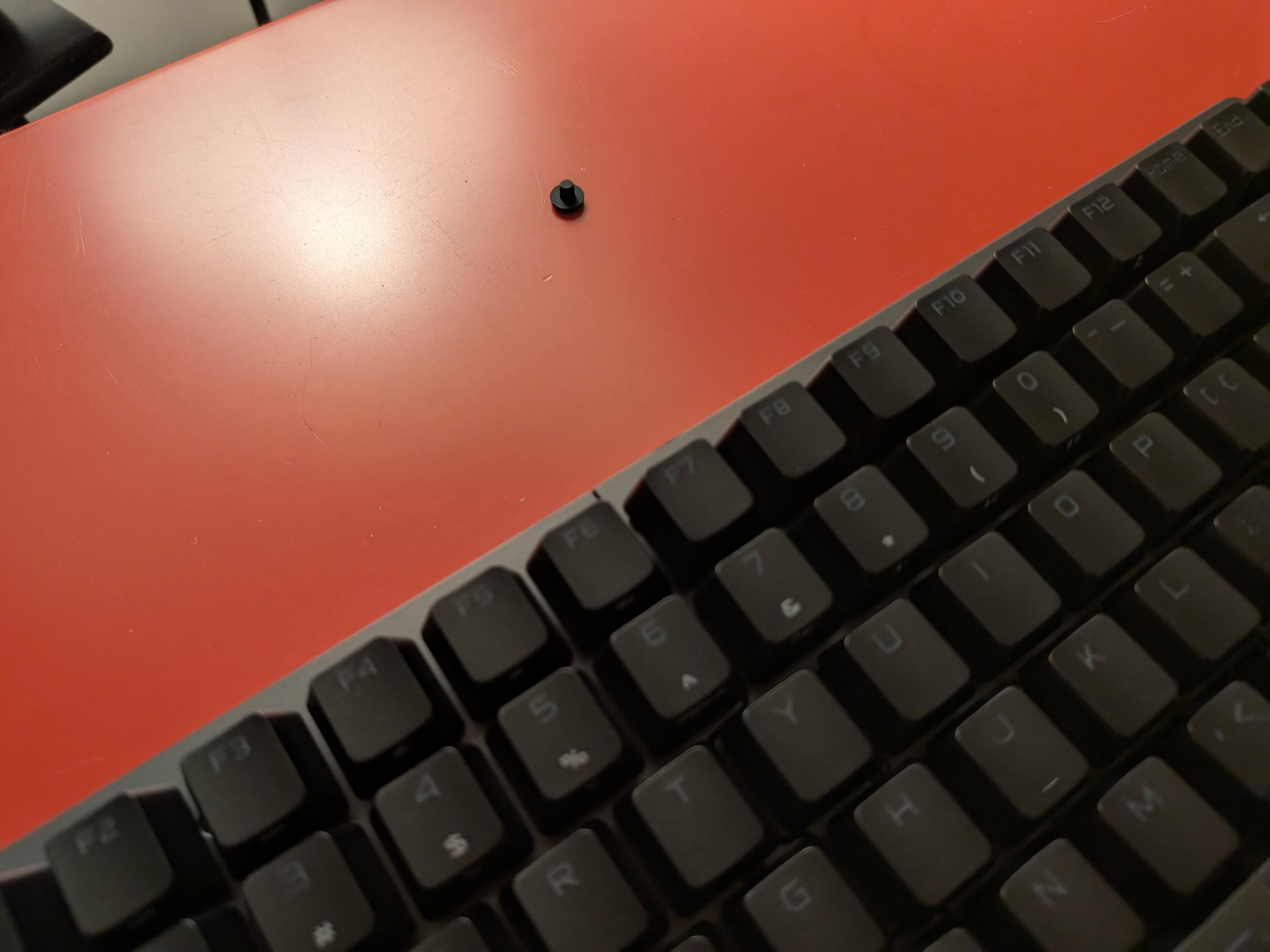 these things fall out of the keyboard all the time. I already lost one., click to load a larger version