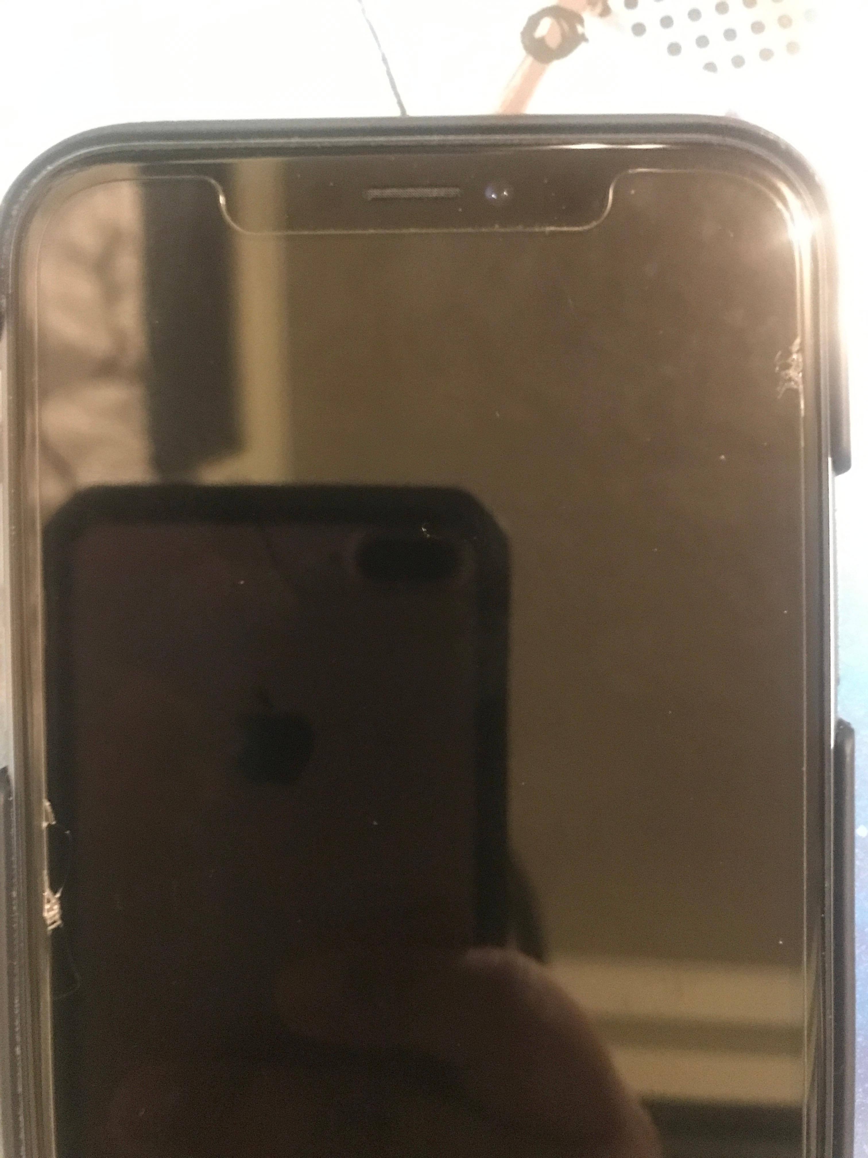 Screen protector cracked on all 4 corners, click to load a larger version
