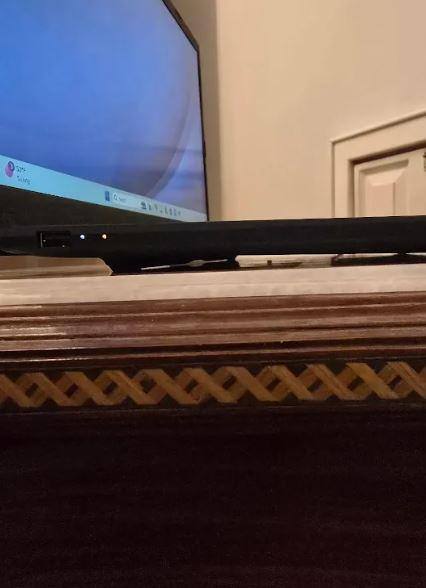 Base has an elevated ridge so laptop has air flow and also supports laying fully flat when open, click to load a larger version