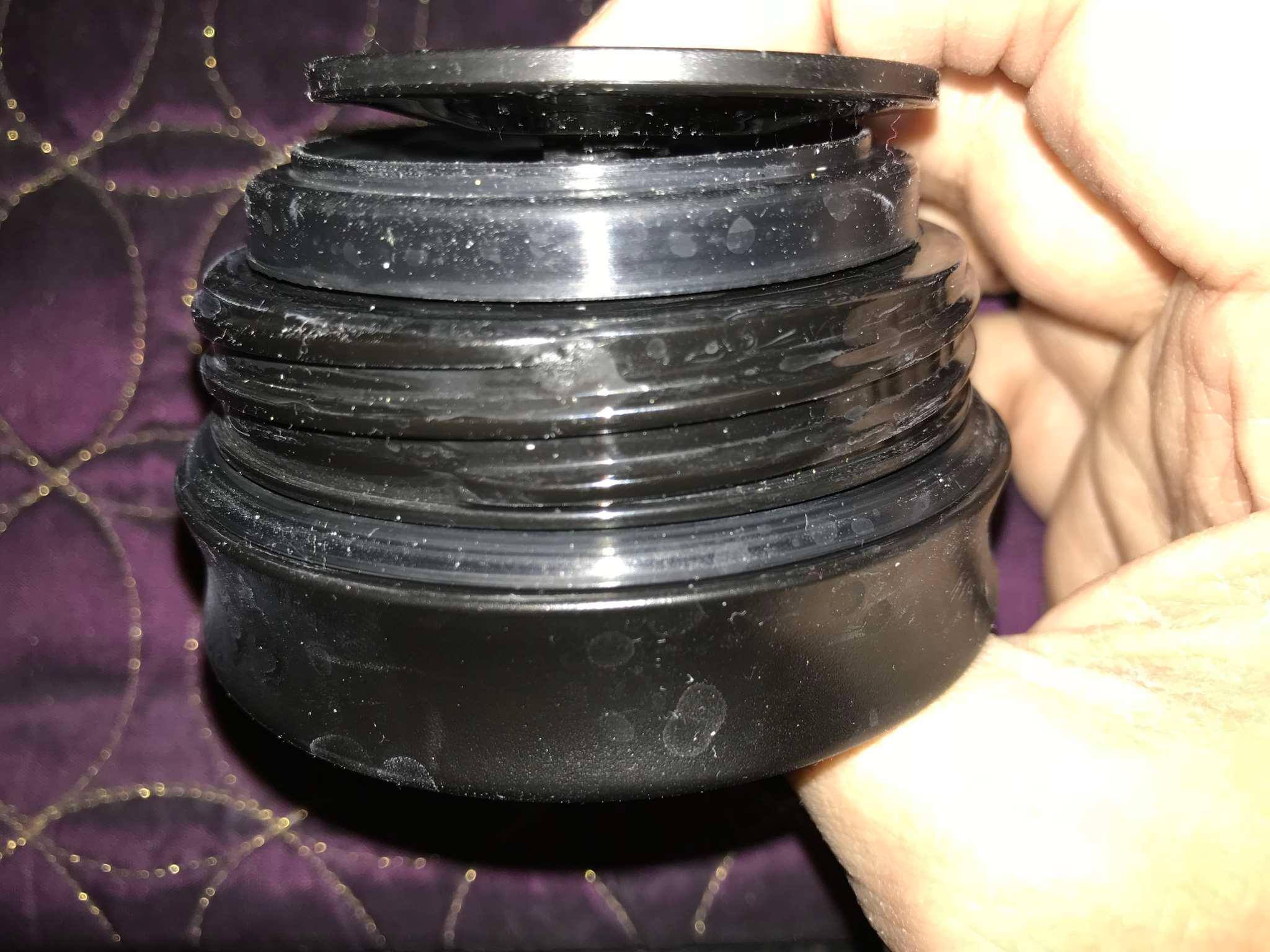 Broken disc at top, with the rest of the lid, click to load a larger version