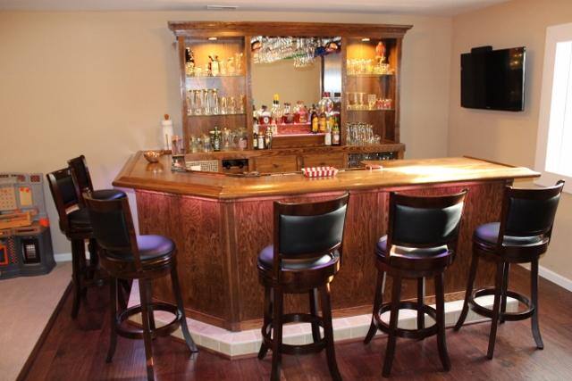 TV hung behind bar, click to load a larger version