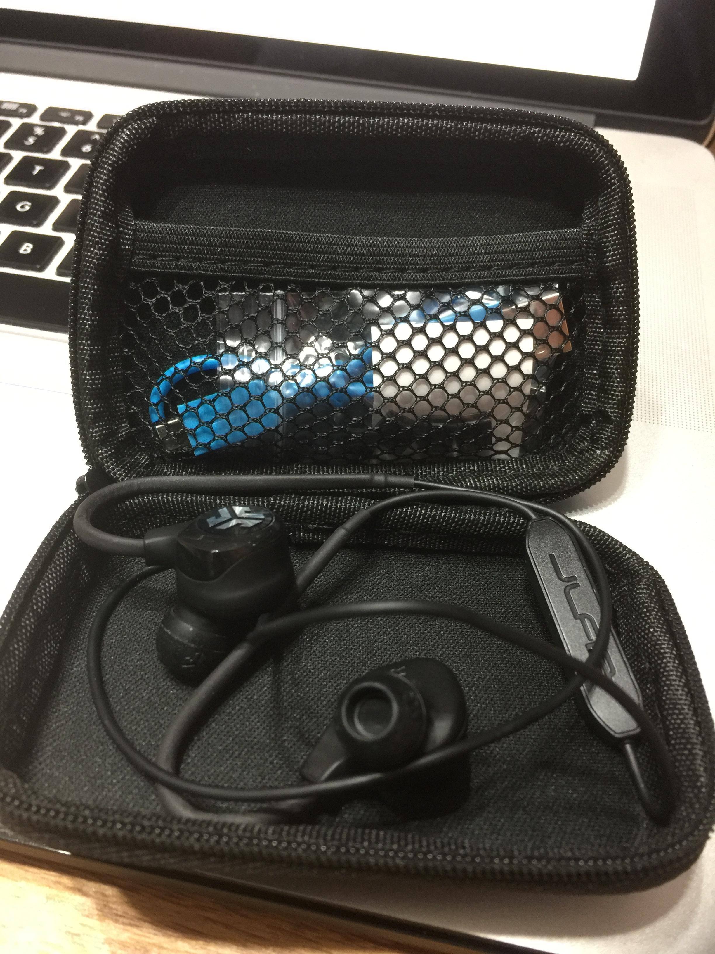 Case and headphones., click to load a larger version