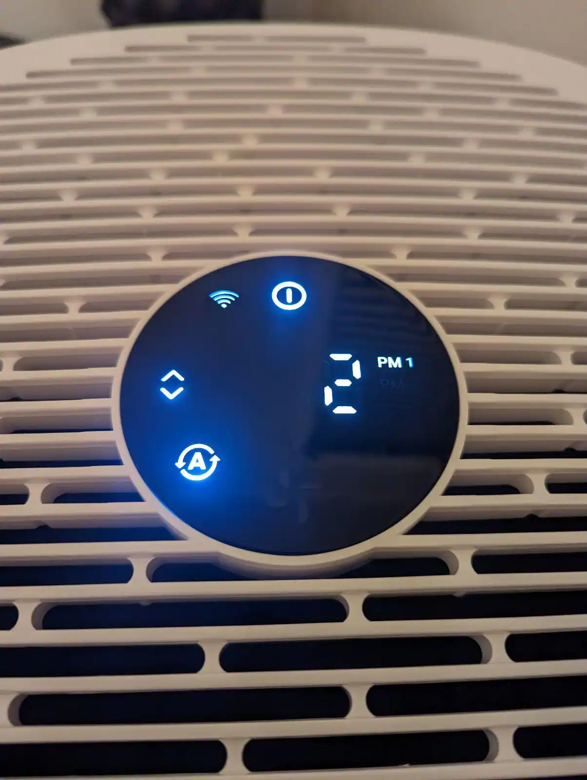 Top of air purifier, touch screen LED, both controls and shows device status., click to load a larger version