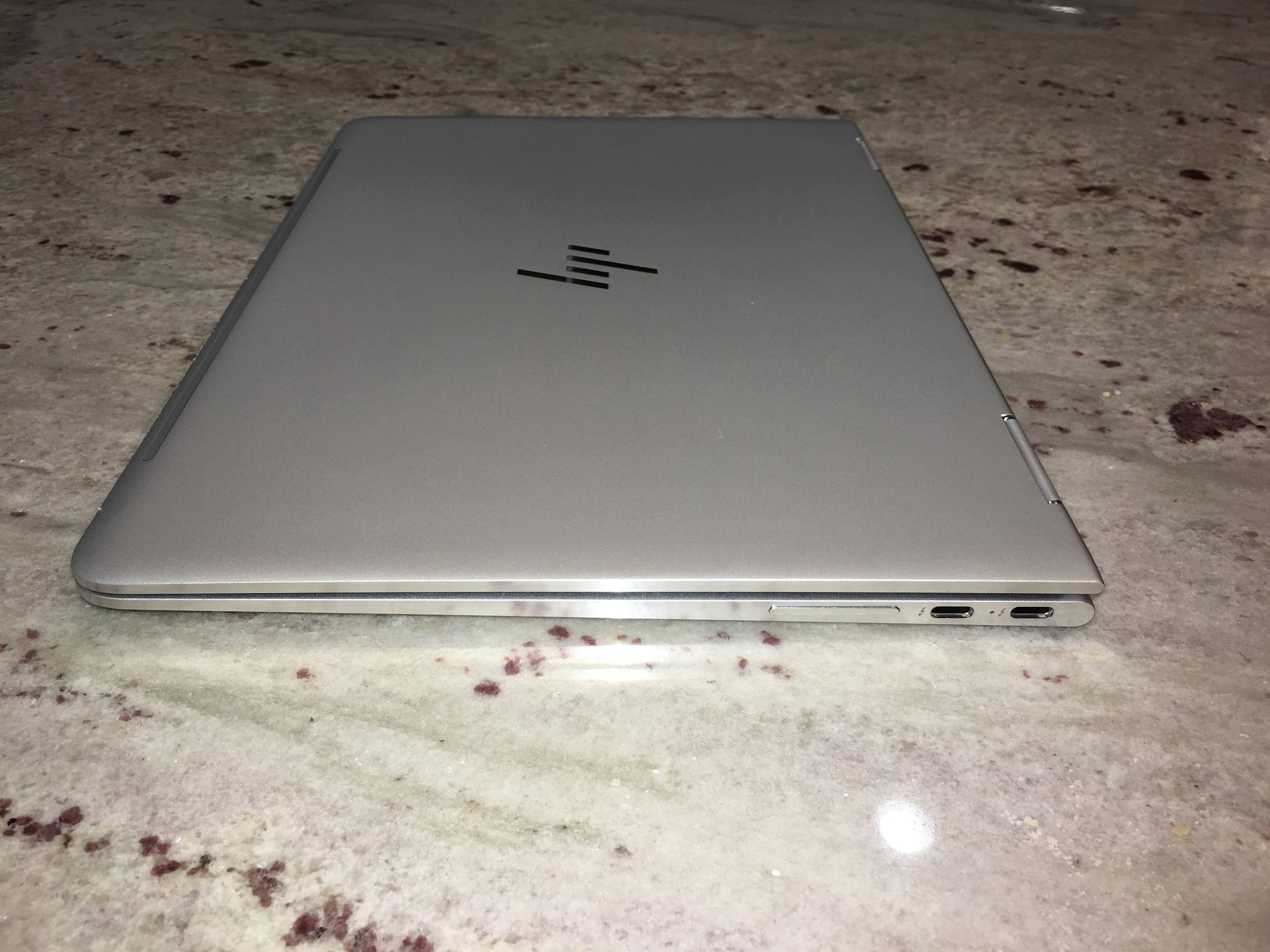 Folded, right angle, Thunderbolt 3 ports and volume rocker, click to load a larger version