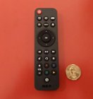This remote is small and cute and the little golden dollar there shows how small it is, click to load a larger version