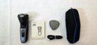 Everything that's included is the shaver. The pouch, the power cable, the cover and instructions. The pouch it's useful when traveling. So I like it very much, click to load a larger version