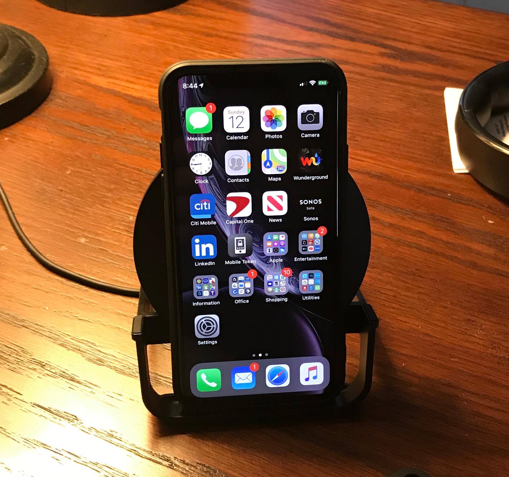 Holding iPhone XS, click to load a larger version
