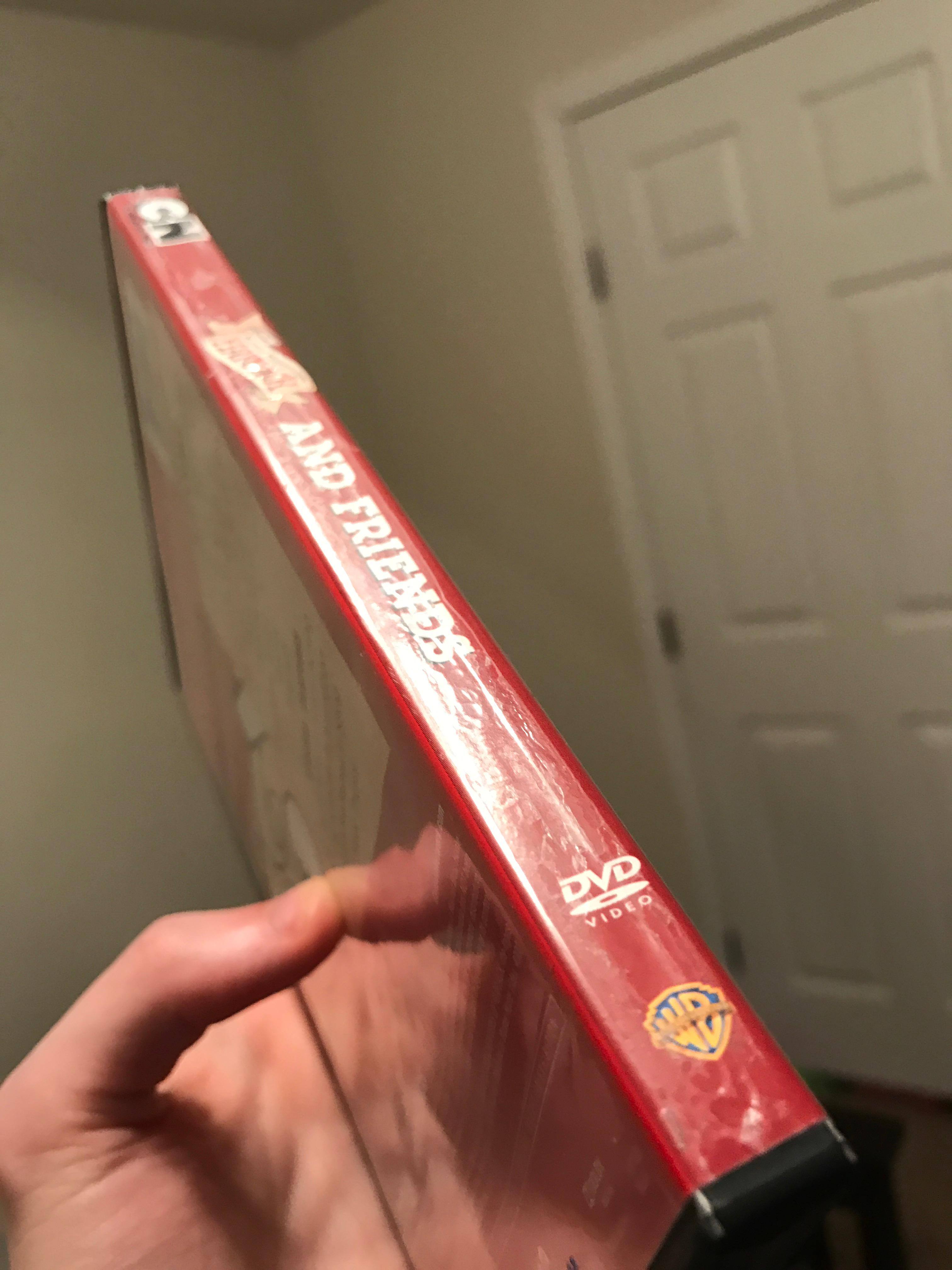 Plastic wrap "melted" to spine, click to load a larger version