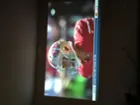 Shot of Football on the big screen w/out projector screen, click to load a larger version