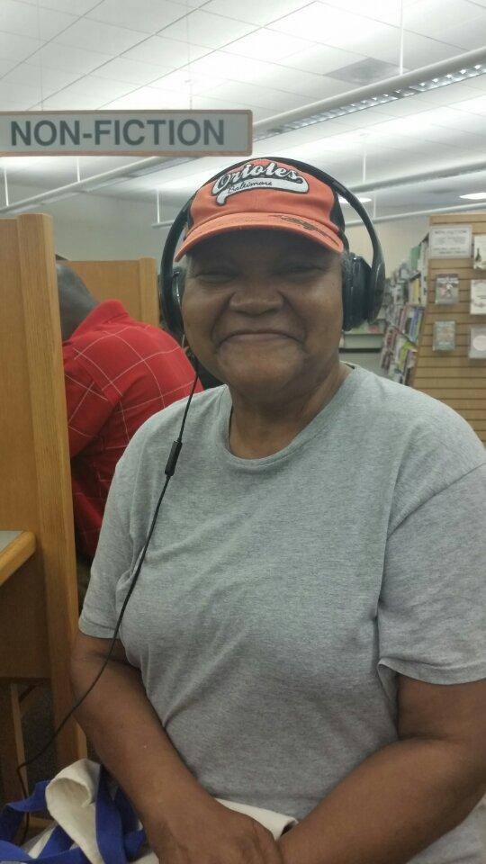 My Mommy enjoying her new headphones, click to load a larger version