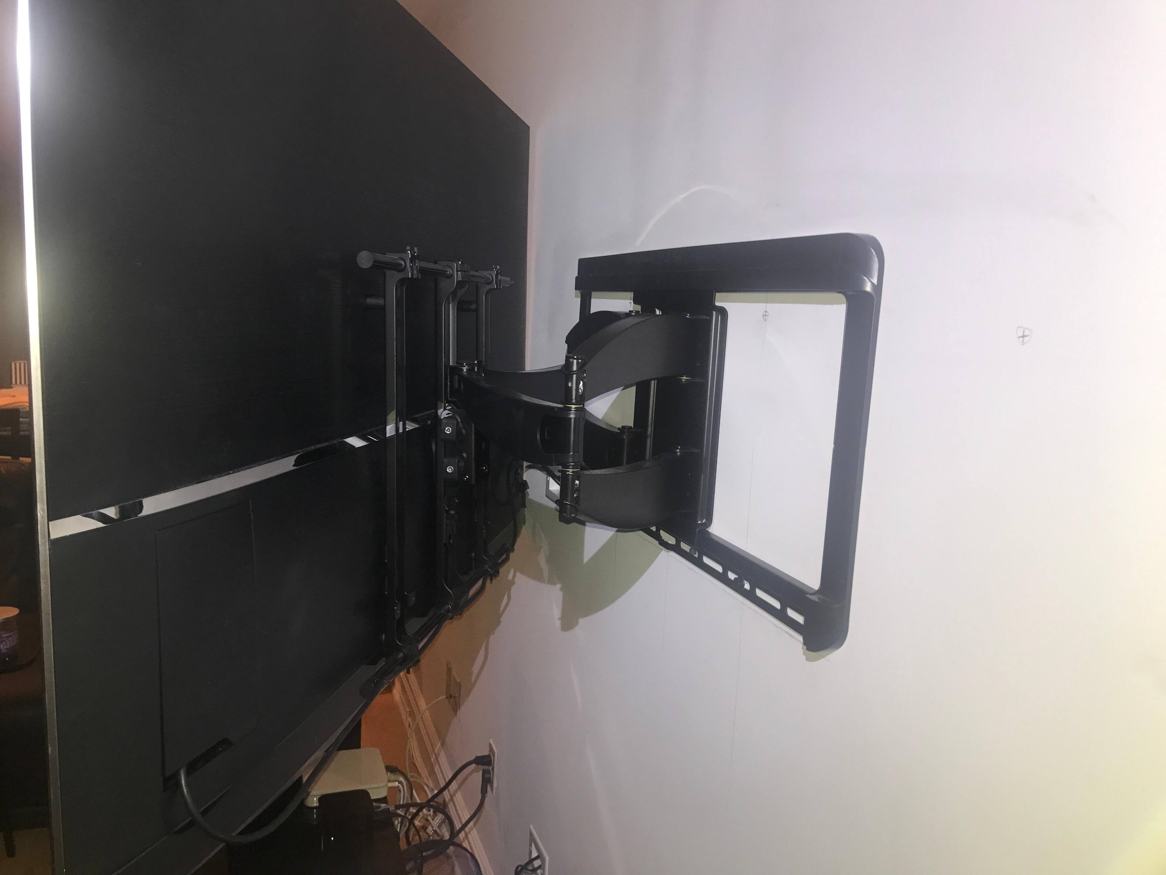 Behind the TV, click to load a larger version