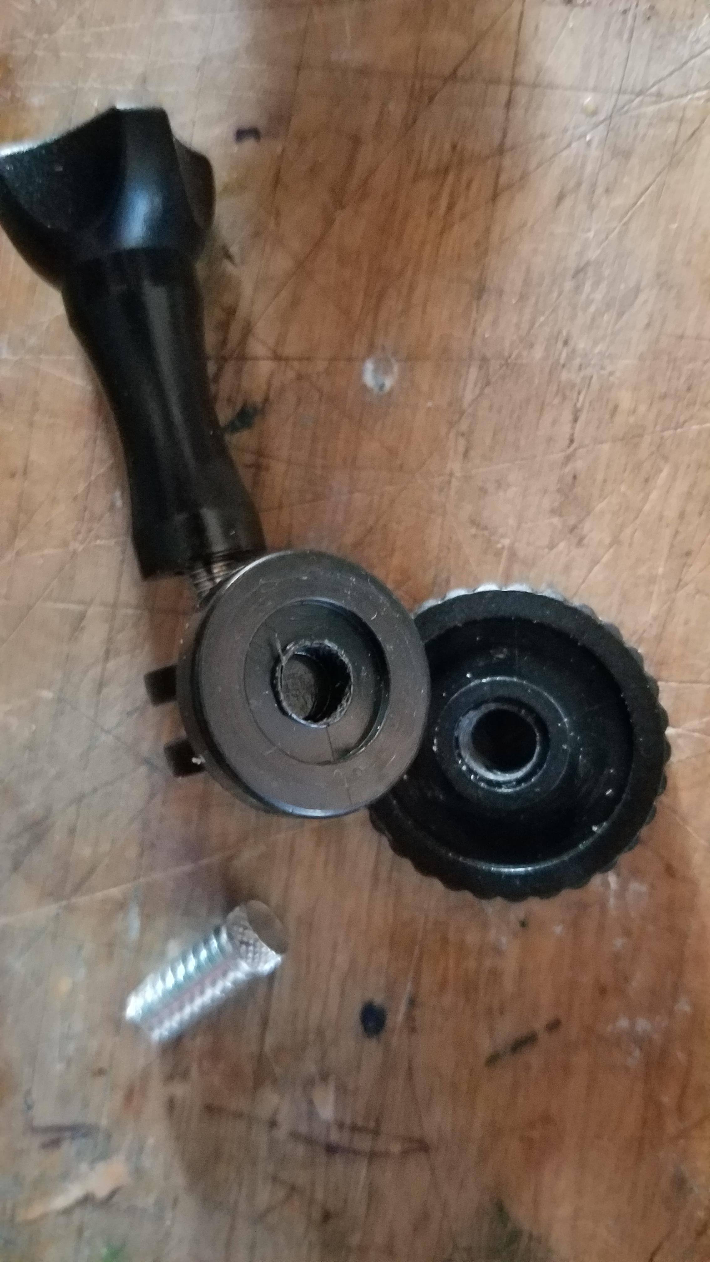 metal screw pulled out of plastic, click to load a larger version