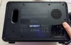 Back with charge port flap., click to load a larger version