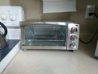 Black & Decker 4-Slice Natural Convection Toaster Oven - Power Townsend  Company