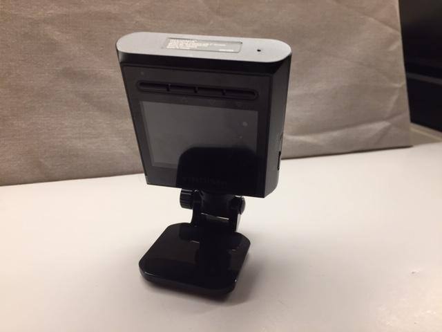 Camera with adhesive adaptor attached, click to load a larger version