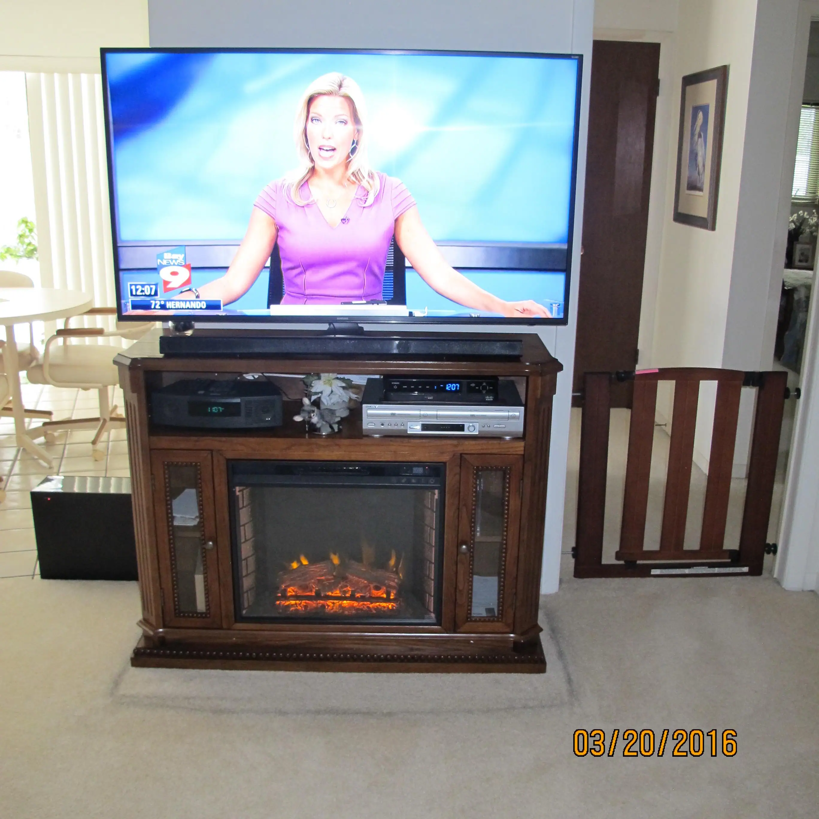 Fireplace with 55" TV, click to load a larger version