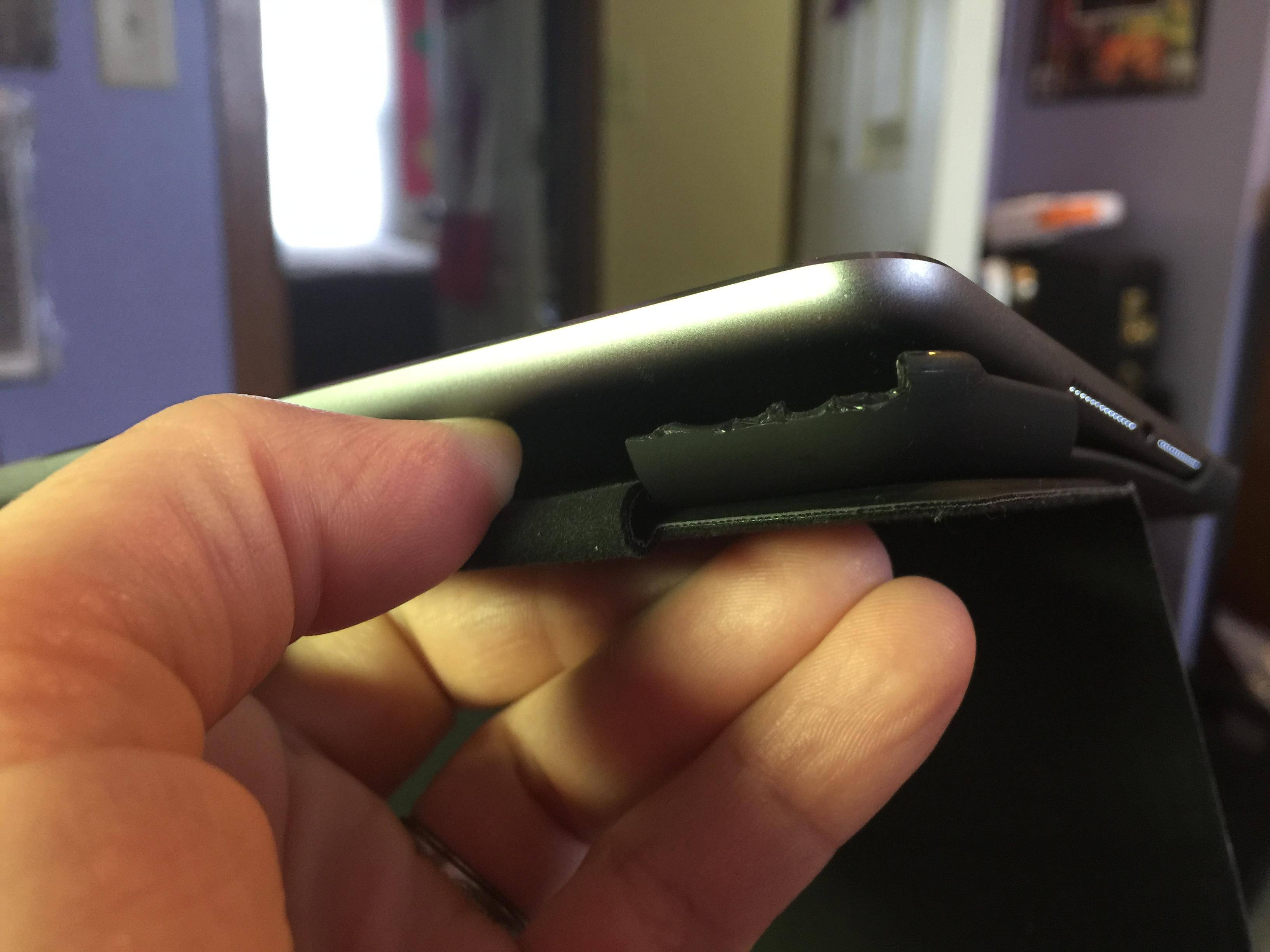 corner by cover not even holding iPad in anymore., click to load a larger version