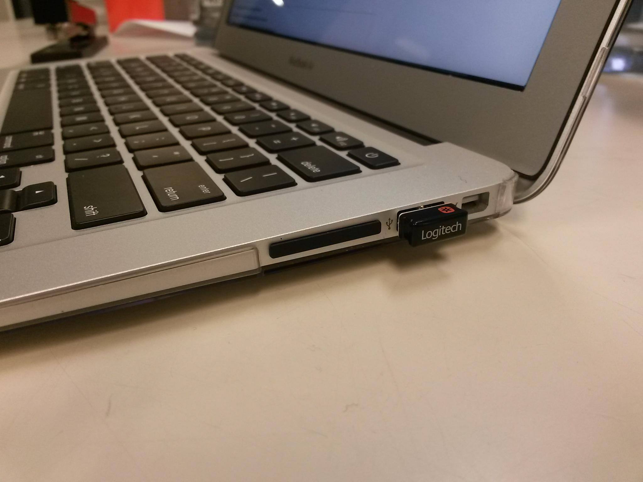 The little black line to the left of LOGITECH is the drive in the slot, click to load a larger version