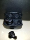 Earbuds have a status light to indicate a charging connection and a charging light briefly lights up between the earbuds, click to load a larger version