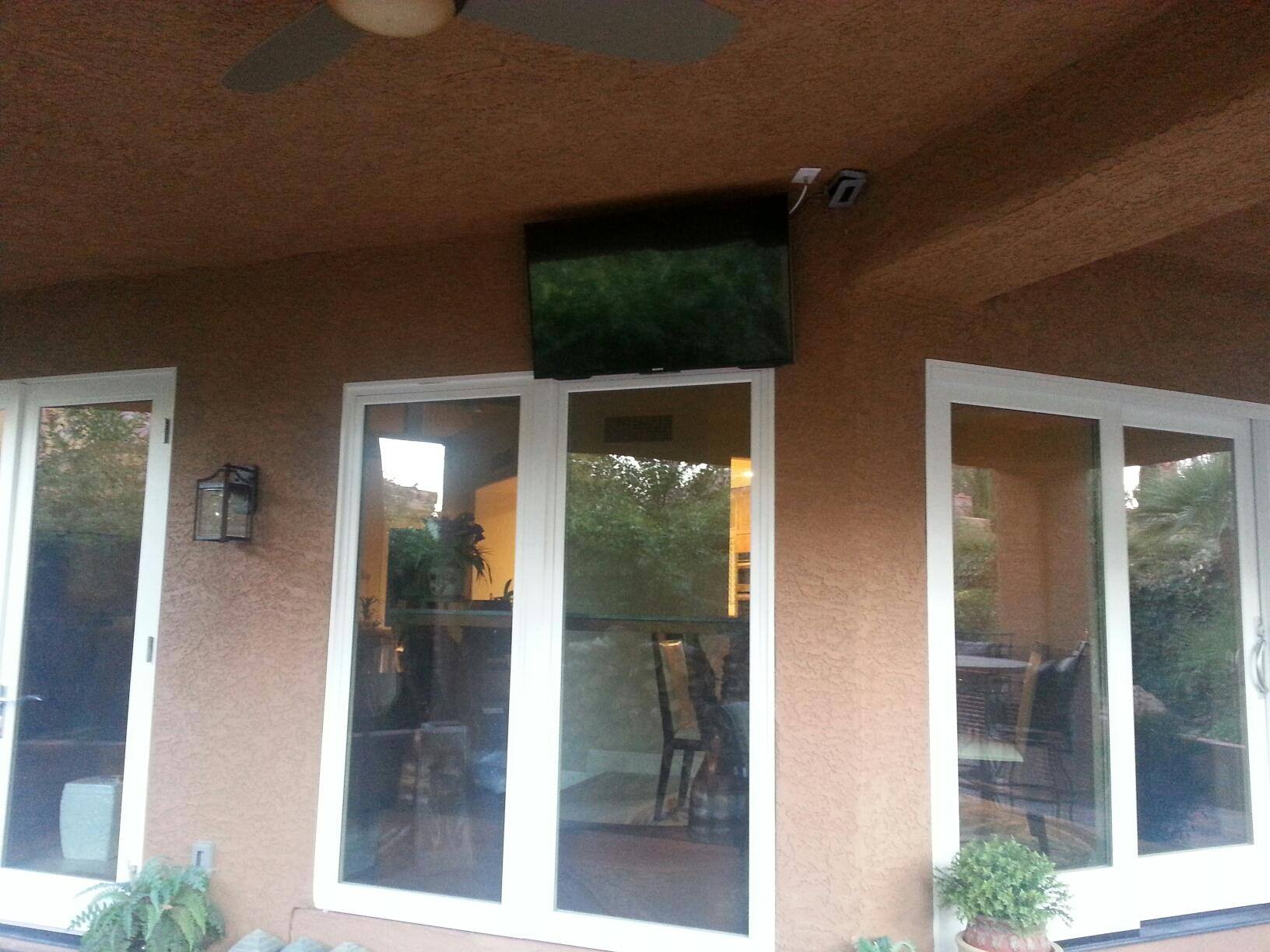 TV mounted outside, click to load a larger version