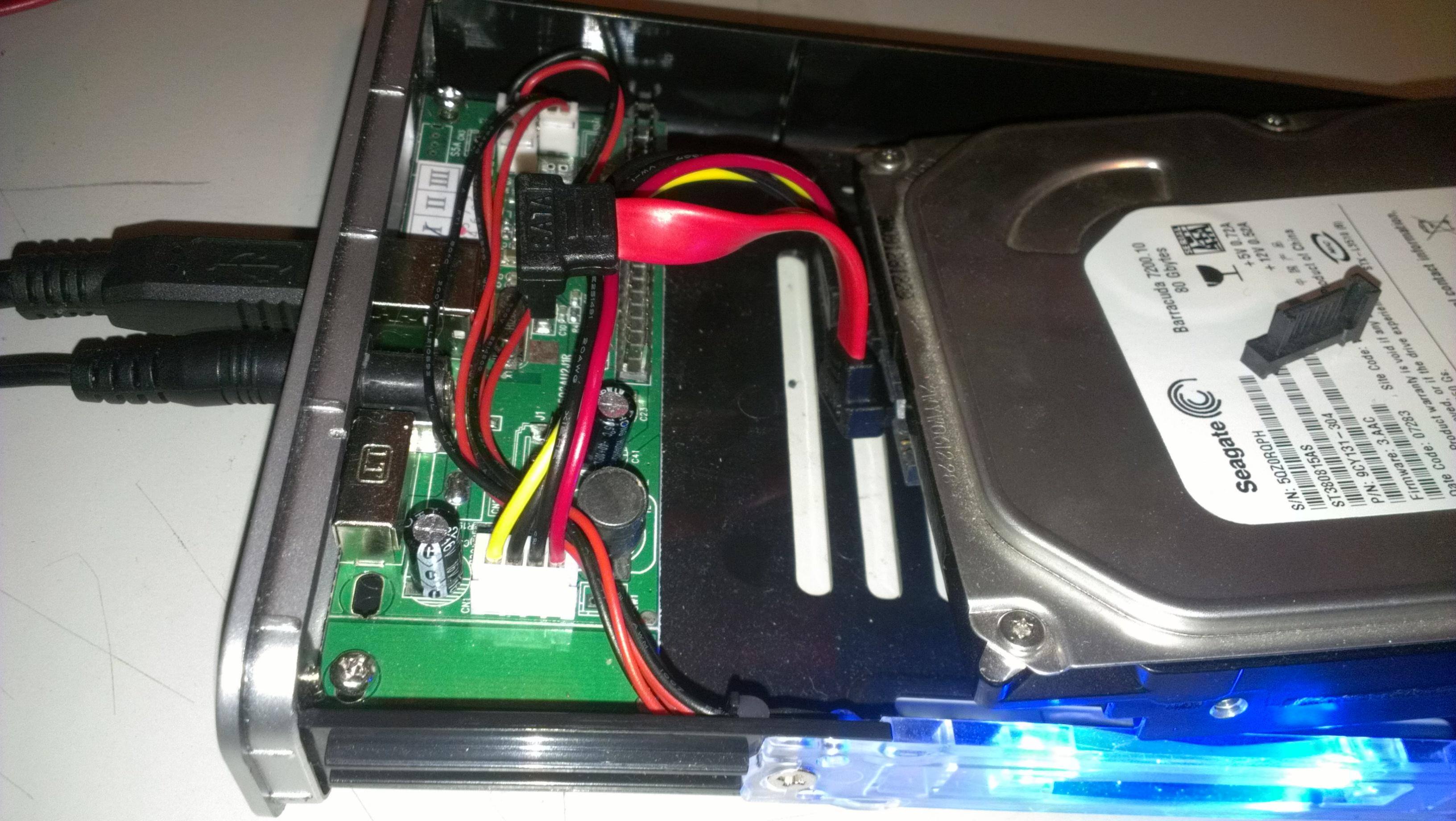inside of case, sata cable, and circut board., click to load a larger version